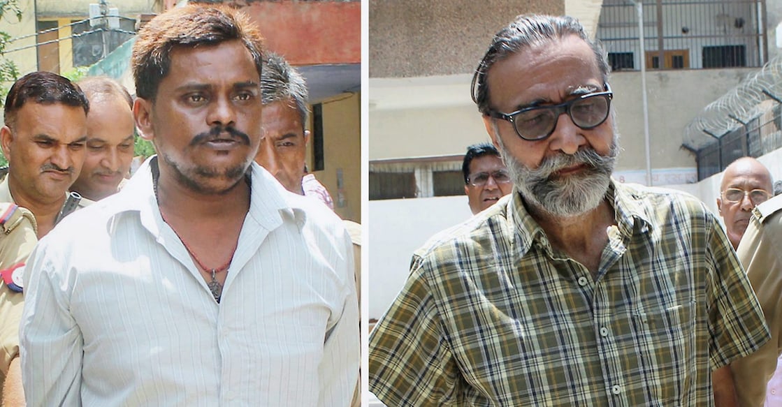 Surendra Koli (L) and Mohinder Pandher (R) being taken to jail after a CBI court awarded death sentence to them in 2017 in Nithari killing case. Photo: PTI/ File Image