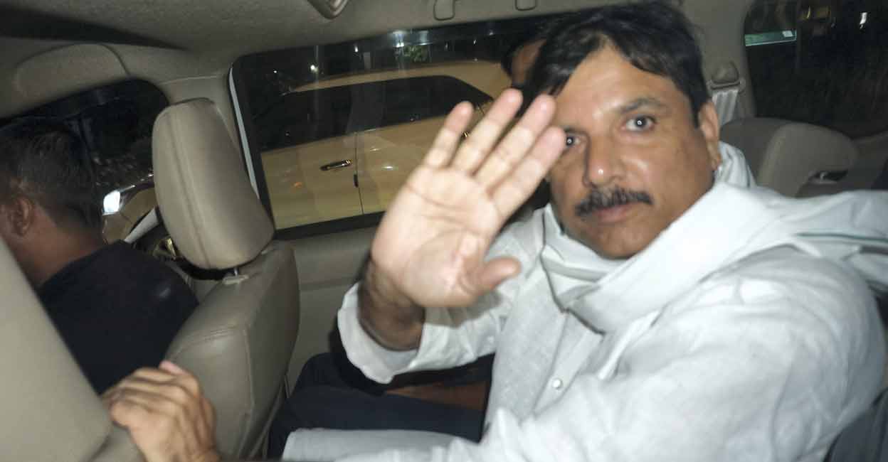 AAP Rajya Sabha MP Sanjay Singh being arrested by the Enforcement Directorate in connection with the Delhi excise policy case, in New Delhi, Wednesday, October 4, 2023. Photo: PTI