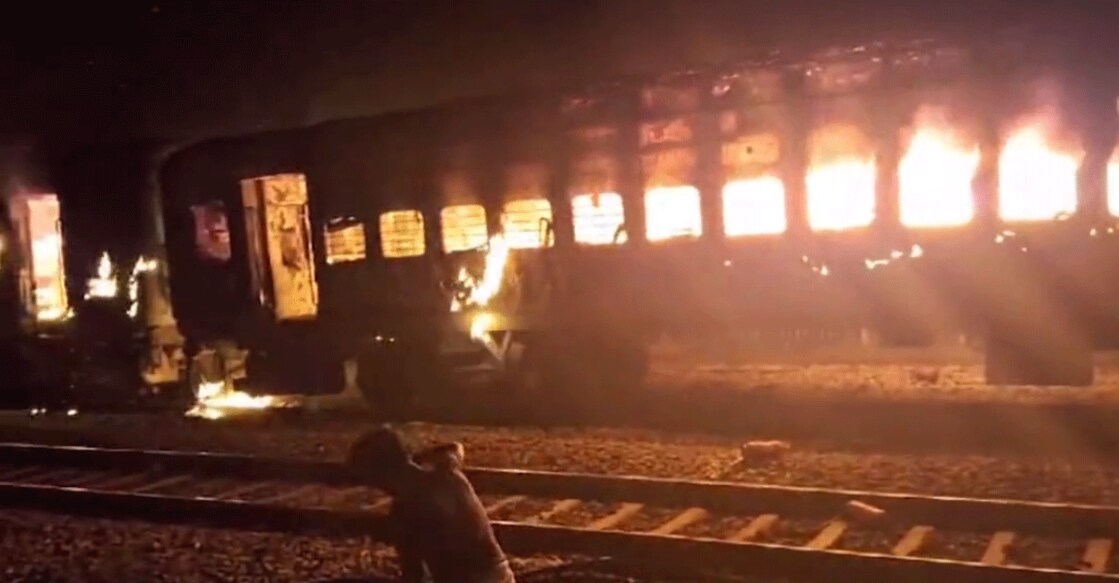 The New Delhi-Darbhanga Special Express on fire. Photo: Screengrab/PTI