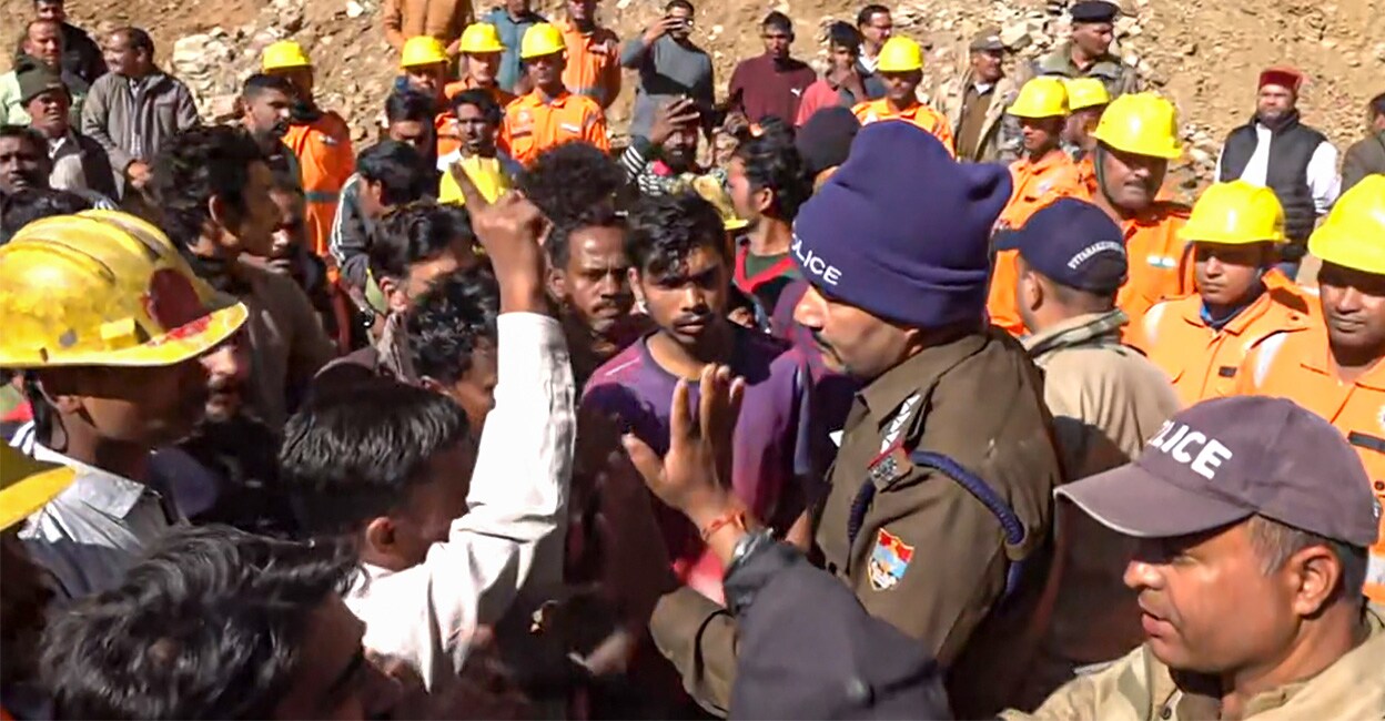 uttarakhand-tunnel-collapse-drilling-add-1 Workers protest over delay in rescuing fellow workers trapped for over three days inside an under-construction tunnel between Silkyara and Dandalgaon. Photo: PTI