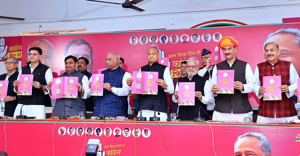 rajasthan-congress-manifesto Congress President Mallikarjun Kharge with Rajasthan Chief Minister Ashok Gehlot and State Congress President Govind Singh Dotasara releases the party's manifesto for the State Assembly elections, in Jaipur, Tuesday, November 21, 2023. Photo: PTI