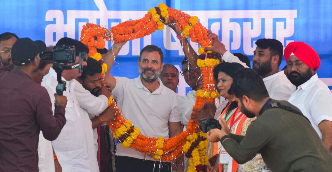 PTI11_04_2023_000297B Congress leader Rahul Gandhi being garlanded at the 'Bharose ka Sammelan' in Jagdalpur on Saturday, ahead of Chhattisgarh Assembly Elections. Photo: PTI