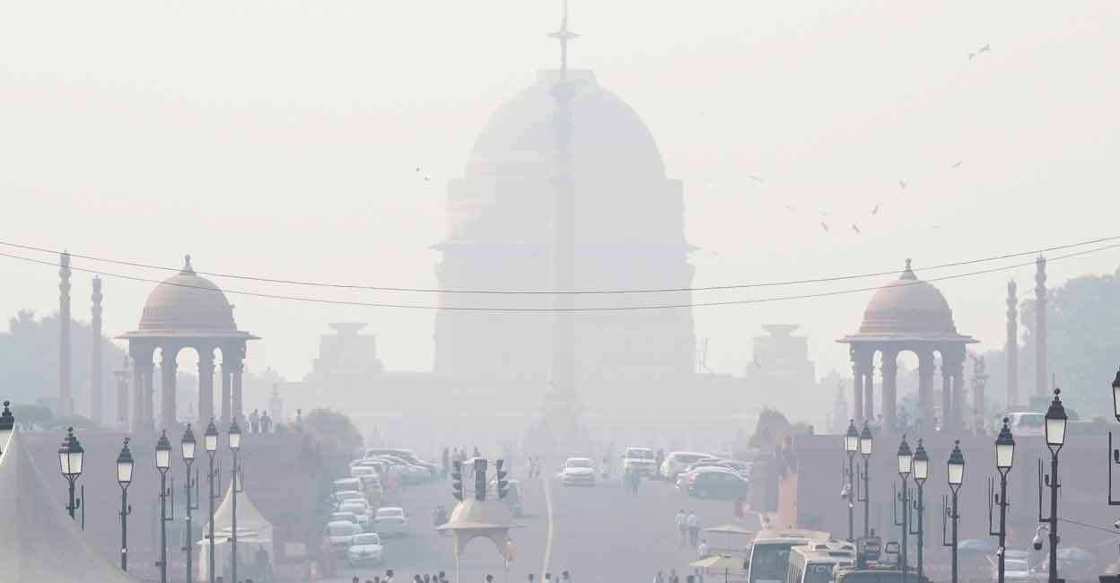 A thick blanket of smog covers the Rashtrapati Bhavan, in New Delhi, Monday, Nov. 6, 2023. Photo: PTI