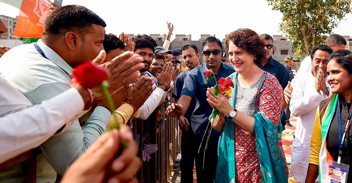 PTI11_08_2023_000314A Priyanka Gandhi Vadra being greeted by party workers at a public meeting State Assembly elections, in Sanwer, Madhya Pradesh. Photo: PTI