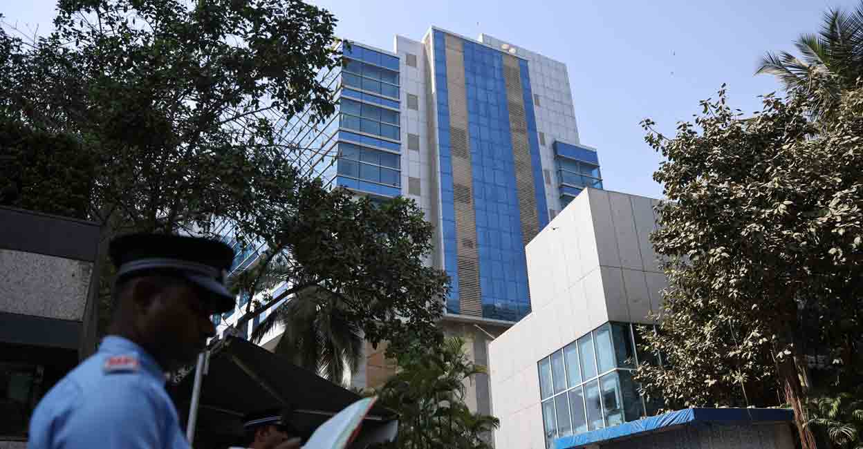 BBC Office A private security guard stands outside a building with BBC offices, where income tax officials are conducting a search, in Mumbai, India, February 14, 2023. REUTERS/Francis Mascarenhas