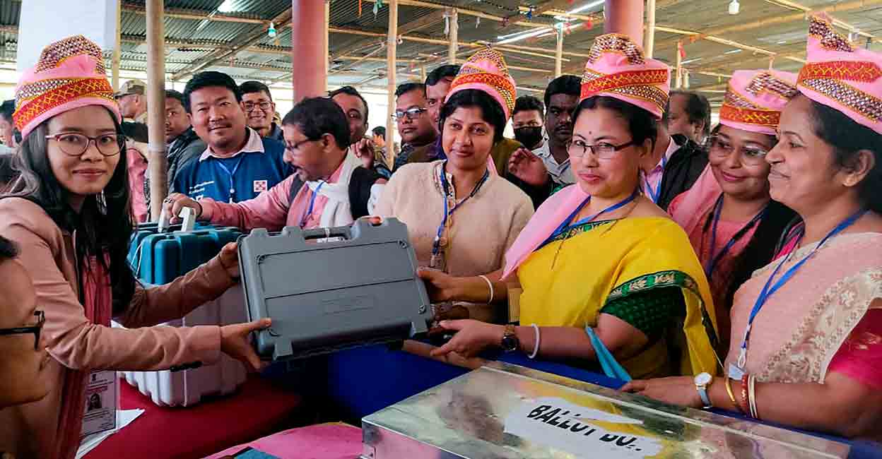 Women poll officials collect EVMs and other election material for the Tripura Assembly elections on Wednesday, Feb. 15, 2023. 97 'pink' polling booths, to be managed by all-woman staff, have been set up in Tripura for the assembly polls. Photo: PTI