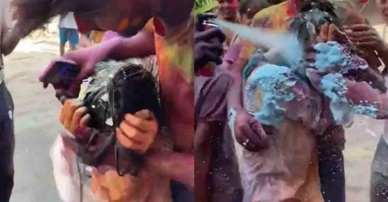 A group of men harassing and groping a Japanese woman on Holi in Delhi. Photo: Twitter/ Screengrab