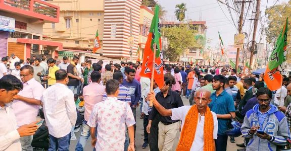 BJP workers gather outside the party office during counting of votes for Tripura Assembly elections, in Agartala BJP workers gather outside the party office during counting of votes for Tripura Assembly elections, in Agartala