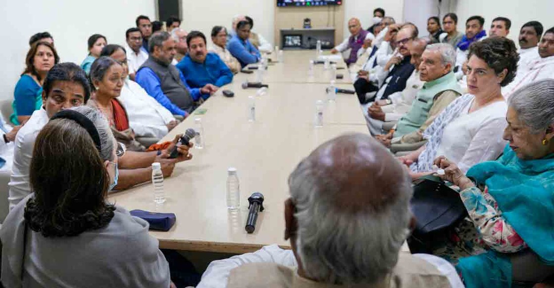 Congress President Mallikarjun Kharge with party leaders Sonia Gandhi, Priyanka Gandhi and others during a meeting at AICC headquarters, in New Delhi, Friday, March 24, 2023, after Rahul Gandhi's disqualification from Lok Sabha following his conviction in a defamation case and over other issues. Photo: PTI