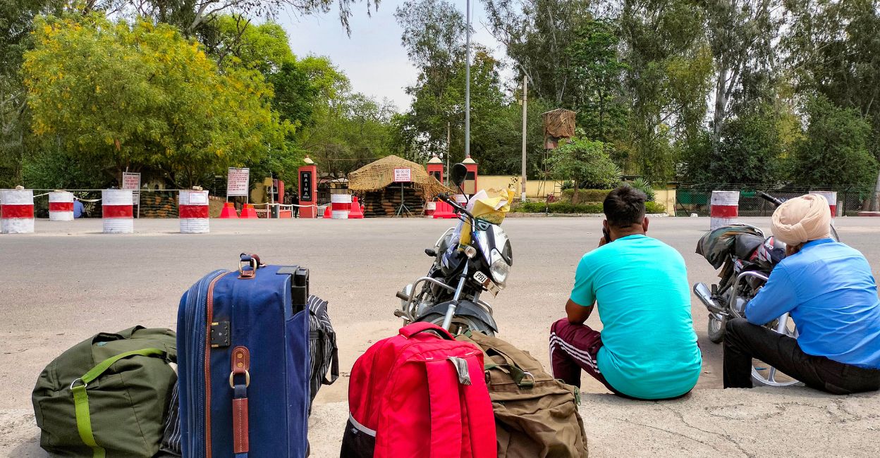 Soldiers, who returned after leave, wait outside the Bathinda military station after a firing incident took place, in Bathinda, Wednesday morning, April 12, 2023. Photo: PTI