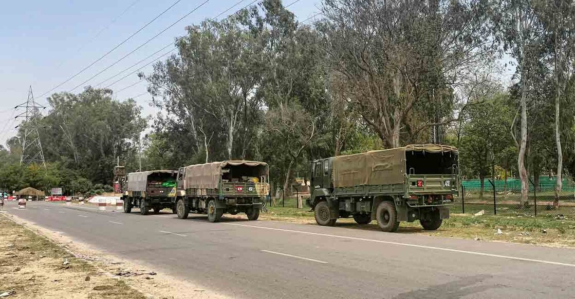 Army vehicles outside the Bathinda military station where a firing incident took place, in Bathinda, Wednesday morning, April 12, 2023. Photo: PTI