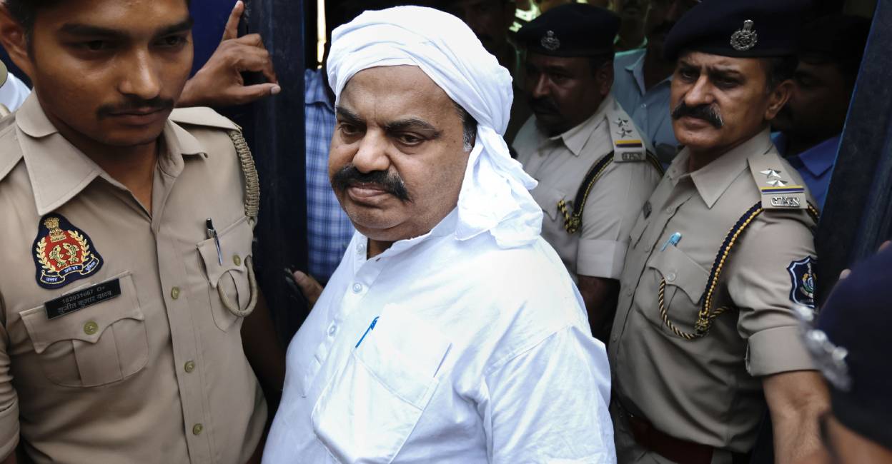 Gangster-turned-politician Atiq Ahmed being brought from Sabarmati Central Jail to present again before a Prayagraj court in the Umesh Pal murder case, in Ahmedabad. Photo: PTI