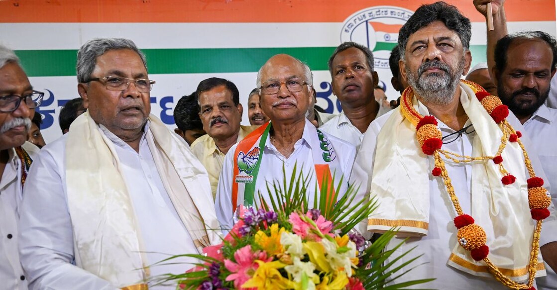 KPCC President DK Shivakumar, party leader Siddaramaiah with BJP leader N Y Gopalakrishna who joins Congress, at KPCC office in Bengaluru, Monday, April 3, 2023. Photo: PTI