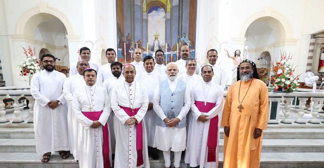 PM Modi with the priests of Sacred Heart Cathedral, Delhi. Photo: Manorama Online