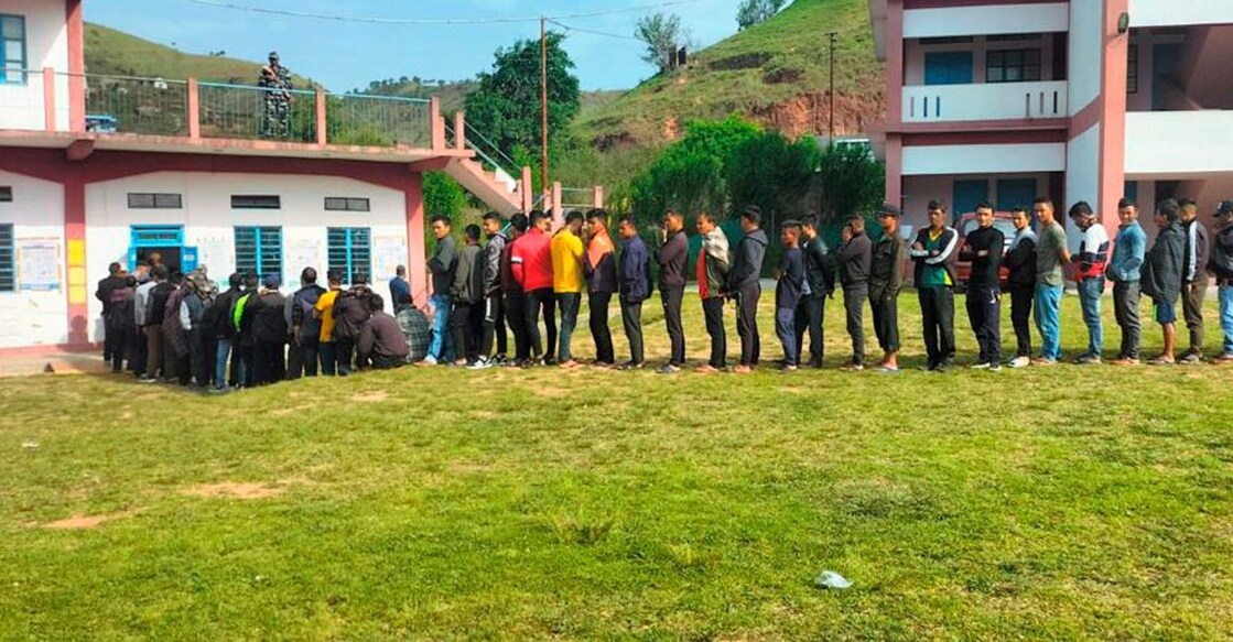 Voters wait in a long queue to cast their votes for Sohiong Assembly seat by-election, in East Khasi Hills district of Meghalaya, Tuesday, May 10, 2023. Photo: PTI