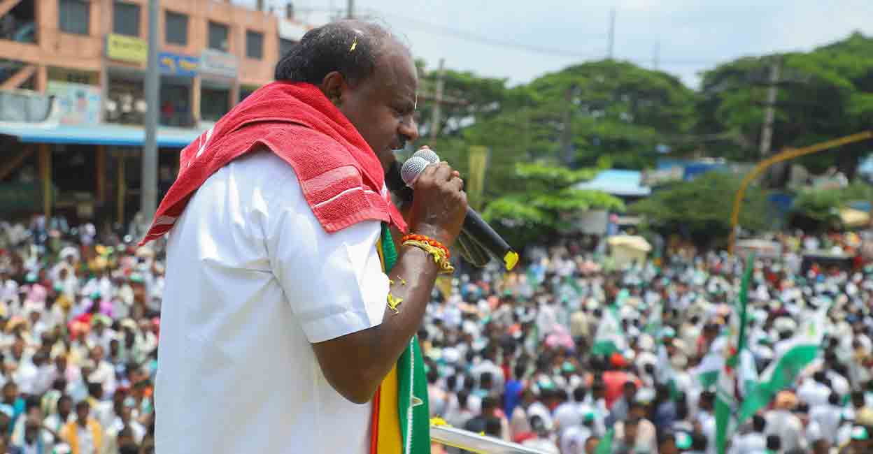 Former Karnataka CM and JD(S) leader H D Kumaraswamy during a roadshow ahead of Karnataka Assembly elections, in Channapatna, Monday, May 8, 2023. Photo: PTI