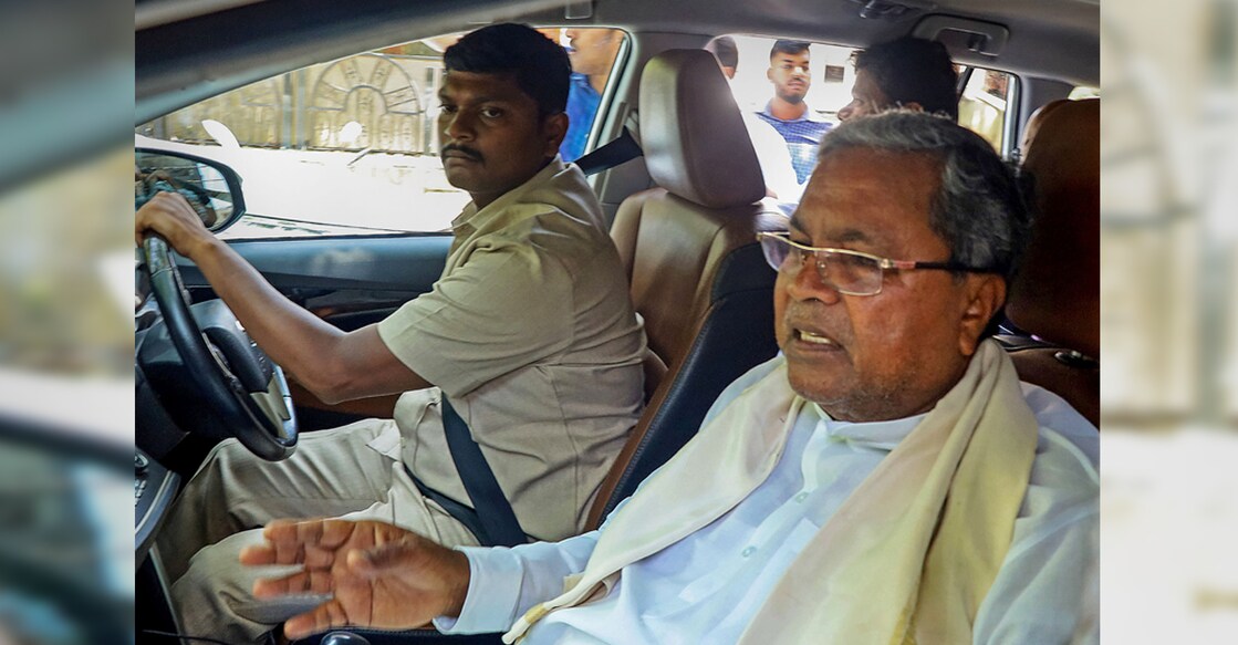Congress leader Siddaramaiah leaves his residence for Delhi to meet senior party leaders, a day after the party's newly elected legislators authorised AICC President Mallikarjun Kharge to decide on Karnataka CM pick, in Bengaluru on Monday. Photo: PTI