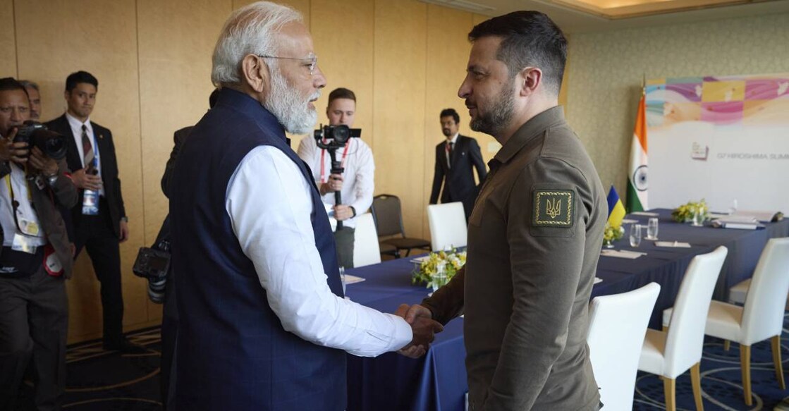 Ukraine President Volodymyr Zelenskyy, right, and Indian Prime Minister Narendra Modi meet at the Grand Prince Hotel, during the G7 Summit in Hiroshima, Japan.