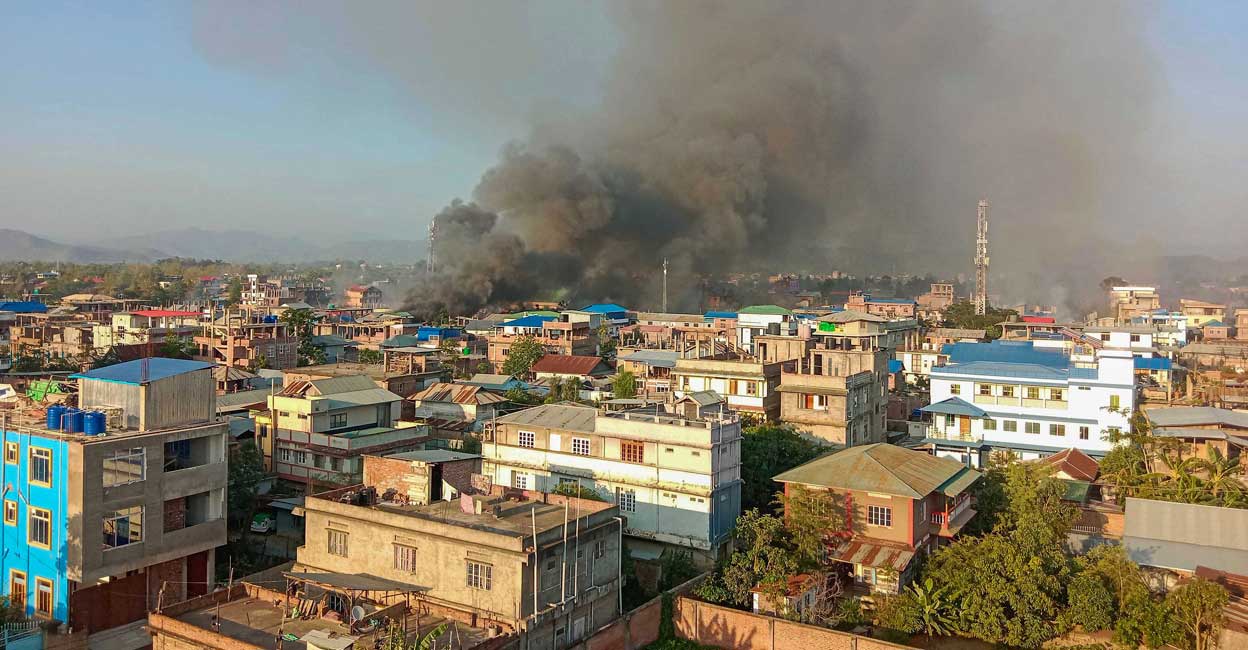 PTI05_28_2023_000292A Imphal: Smoke billows from a fire that broke out amid clashes between armed groups and security forces, in Manipur, Sunday, May 28, 2023. Photo: PTI
