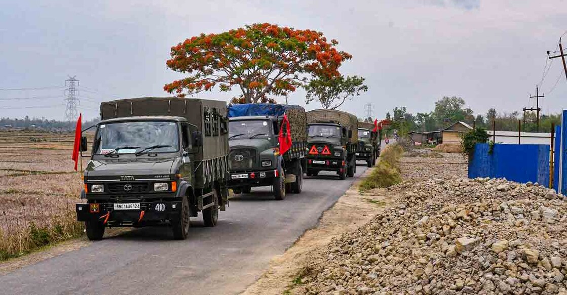 Army and Assam Rifles personnel conduct a flag march in violence-hit areas amid tribal groups' protest over court order on Scheduled Tribe status, Manipur , Friday, May 5, 2023. Photo: PTI