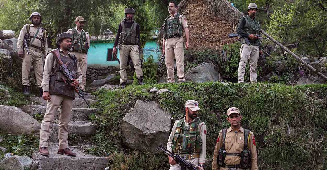 Security personnel near the site of an encounter with terrorists in Kandi area of Rajouri district, Friday, May 5, 2023. Photo: PTI