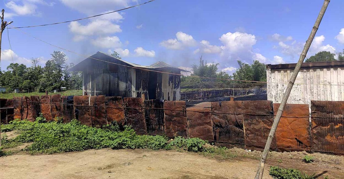Burnt remains of the godown. Photo: PTI