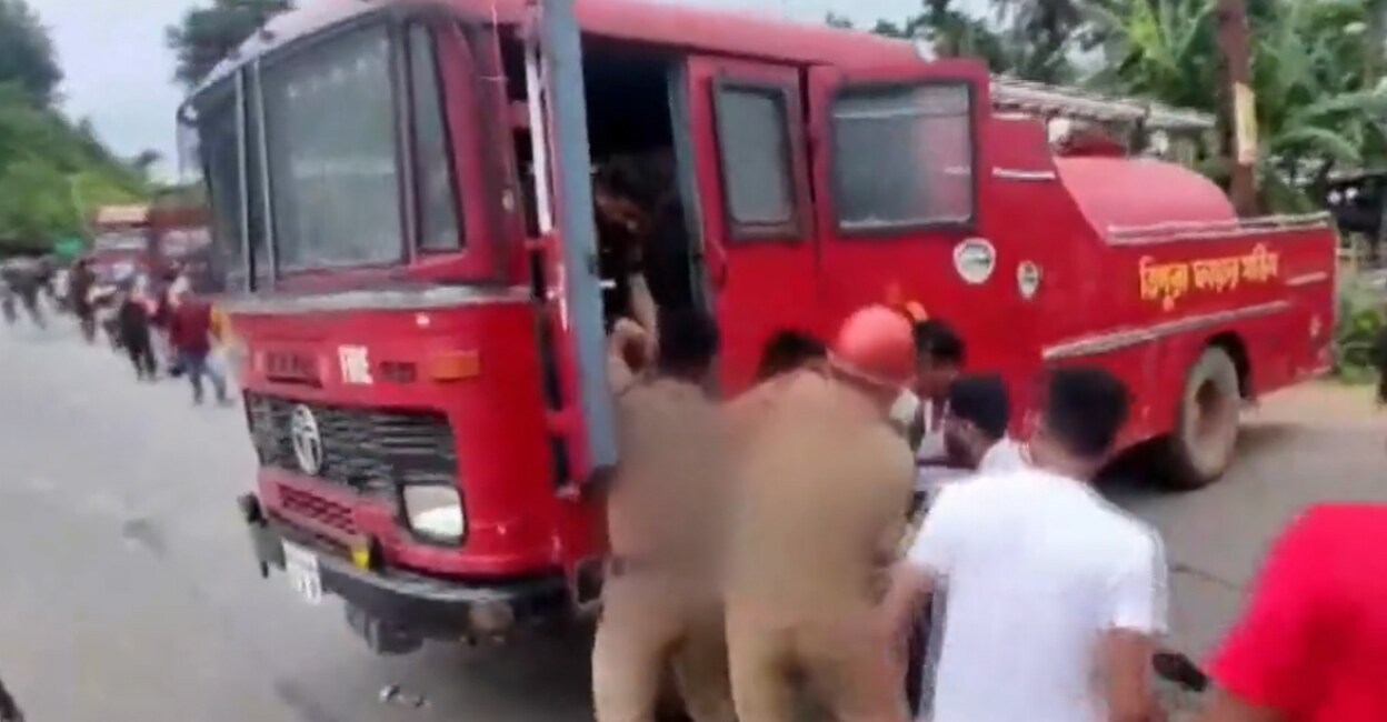 rath-yatra-tragedy-tripura The injured are rushed to a Fire & Rescue vehicle. Photo: Screengrab/PTI
