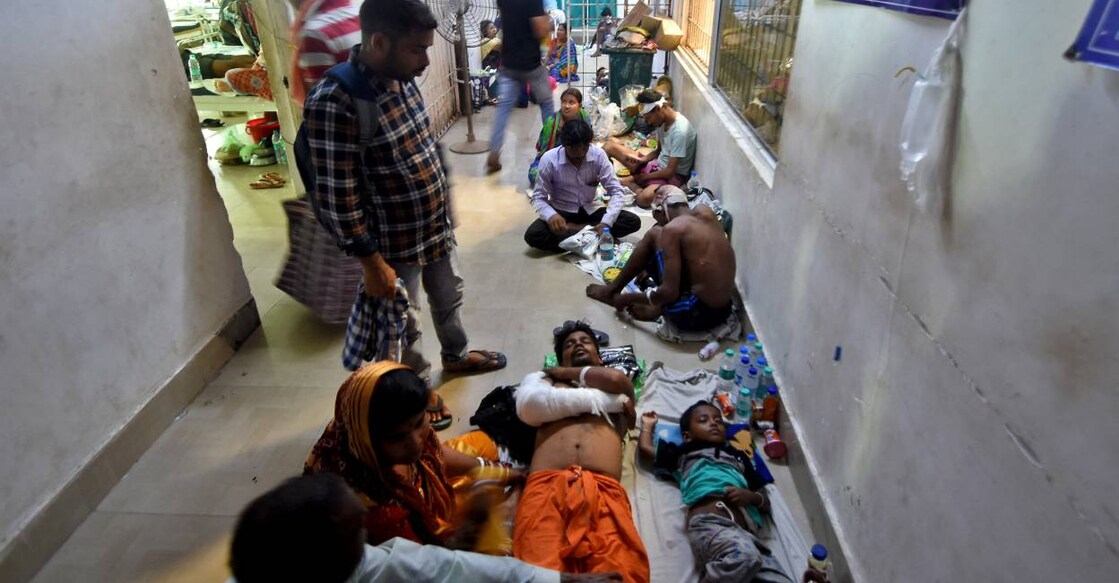 People, who were injured in trains collision, lie in a hospital corridor in Balasore district in the eastern state of Odisha. Photo: Reuters