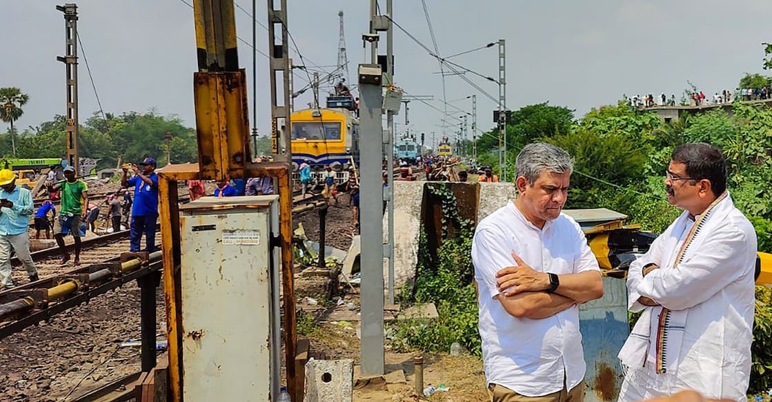 Union Ministers Ashwini Vaishnaw and Dharmendra Pradhan take stock of the ongoing restoration work, at the triple train accident site at Bahanaga Bazar in Balasore, Odisha on Sunday. Photo: PTI