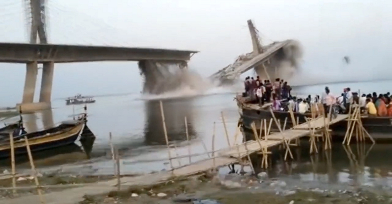 PTI06_04_2023_000289B A screengrab, shared by PTI, from a mobile phone video of the under-construction Aguwani-Sultanganj Ganga bridge collapsing in Bihar's Bhagalpur district on Sunday.