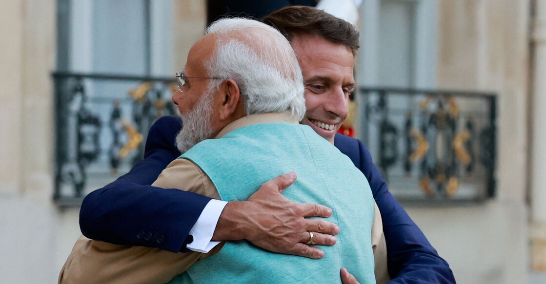 Narendra Modi with Emmanuel Macron. Photo: Reuters/Pascal Rossignol