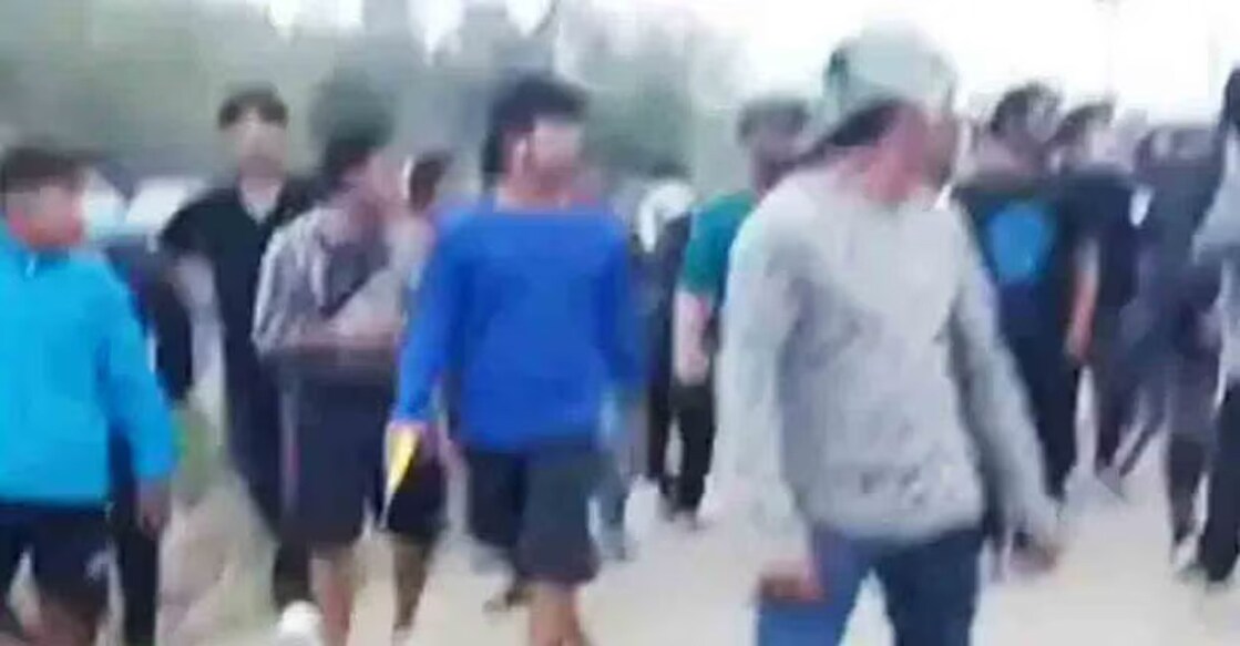 A screengrab from the video shows the mob. 