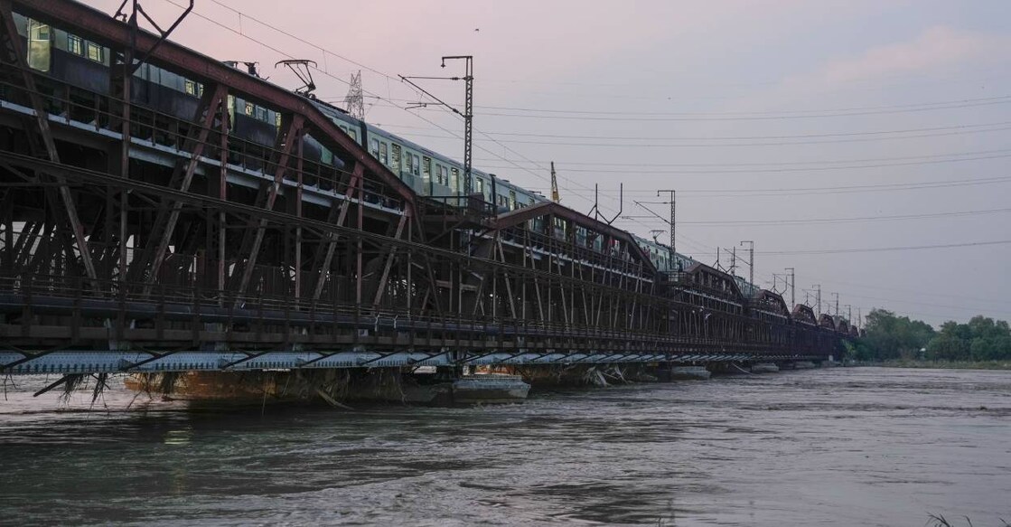 The water level of the Yamuna breaches the danger mark again, at Old Yamuna Bridge. Photo: PTI
