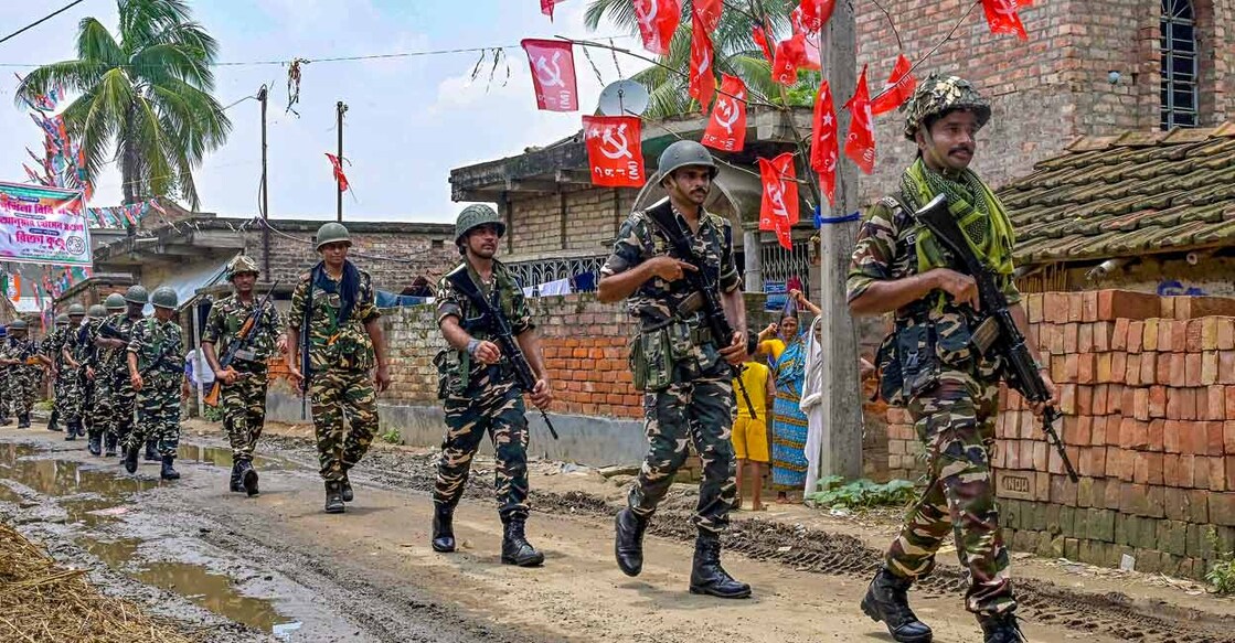 Security personnel conduct a route march ahead of the West Bengal panchayat polls, in Nadia, Friday, July 7, 2023. Photo: PTI