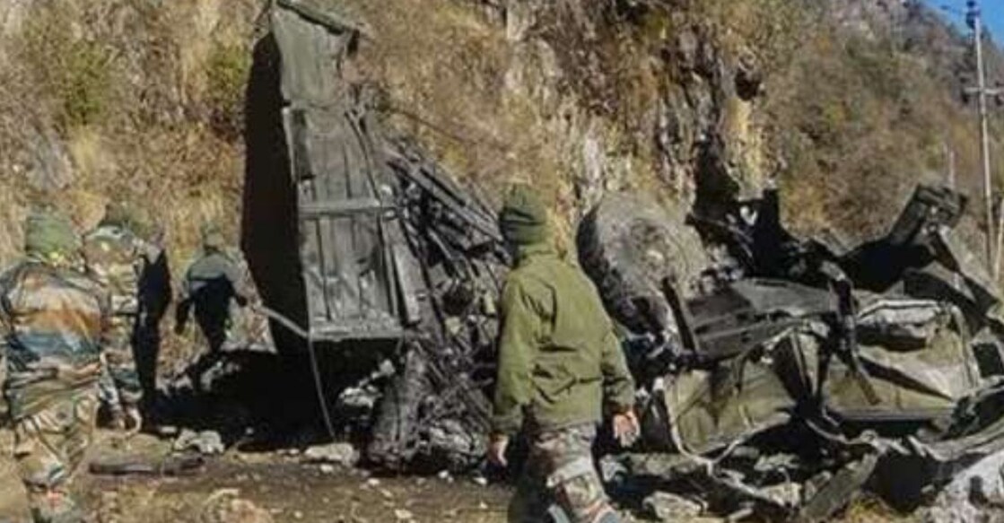 Army personnel inspect the site of the accident. Photo: PTI