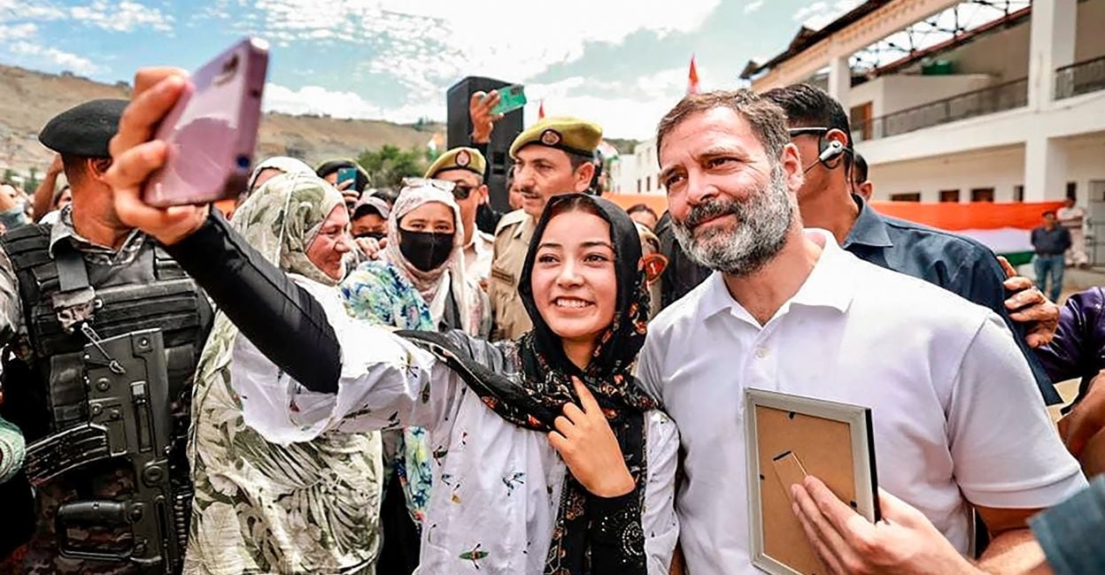 rahul-gandhi-ladakh-1 Congress leader Rahul Gandhi with a young supporter during a public meeting at Khree Sultan Cho Sports Stadium, in Kargil district, Ladakh, Friday, August 25, 2023. Photo: PTI