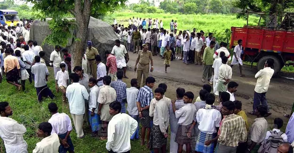 veerappan-story-add-1 Villagers gathered around the Dharmapuri District Hospital to confirm Veerappan's death. Photo: AP/ File Photo/Gautam Singh