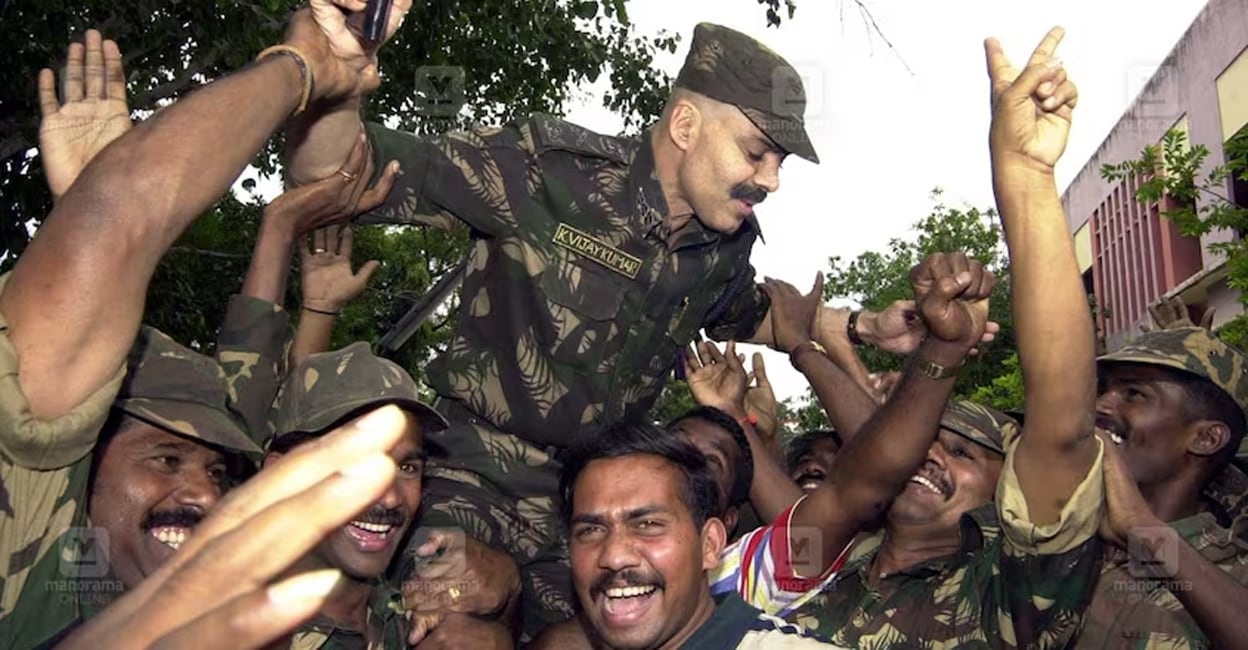 veerappan-story-add-3 STF members carrying Vijaya Kumar on their shoulders, amid celebrations. Photo: AP File Photo/Gautam Singh