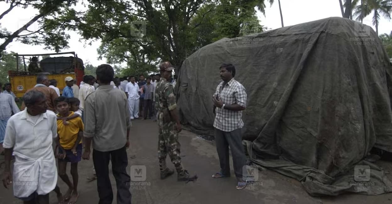 veerappan-story-add-6 The police covered the ambulance with a rust-coloured tarpaulin since the villagers had started inspecting the vehicle. Photo: Manorama Archives