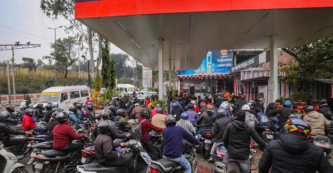 Heavy rush at a petrol pump following the nationwide strike of truck drivers against a provision in the new penal law on hit-and-run accident cases, in Jammu, Tuesday, Jan. 2, 2024. Photo: PTI