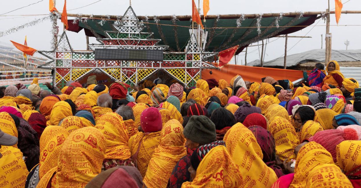 ayodhya-ram-temple-2 Hindu devotees wait to collect free blankets at the tent city built for the pilgrims on the banks of the Sarayu river ahead of the opening of the temple of Lord Ram in Ayodhya, India, January 20, 2024. Photo: Reuters/Adnan Abidi