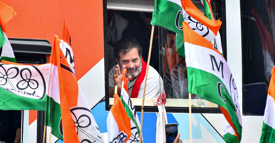 Congress leader Rahul Gandhi waves at supporters during the Bharat Jodo Nyay Yatra, in Guwahati, Assam. Photo: PTI.