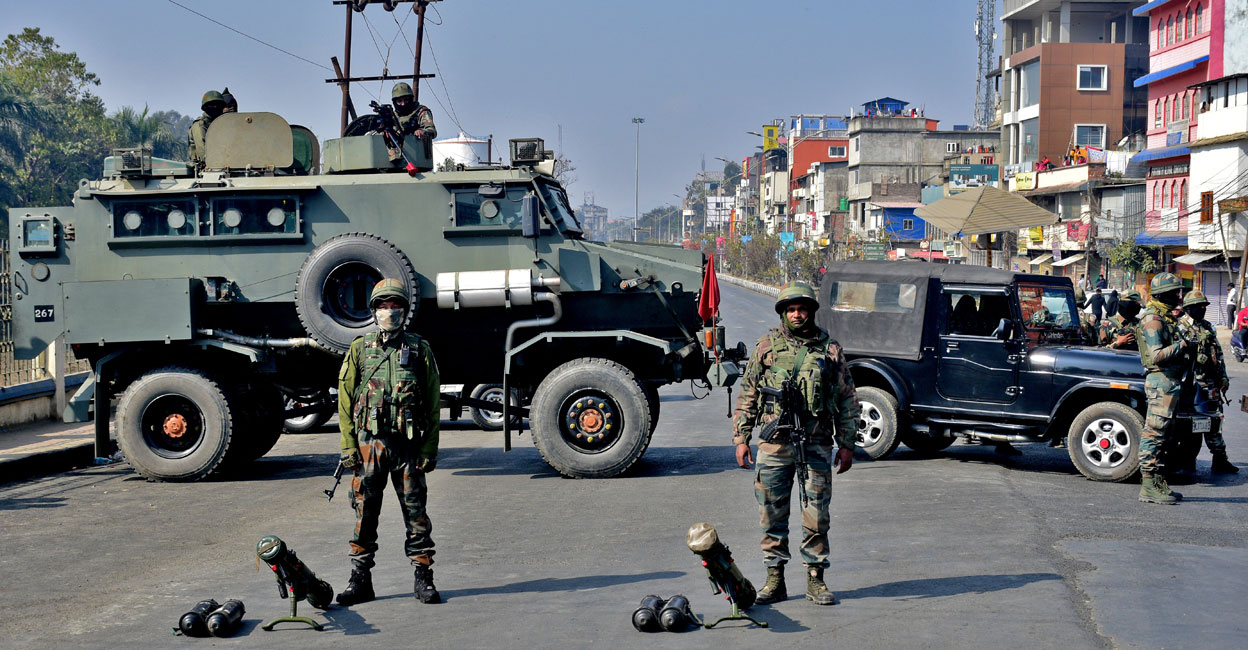 Soldiers block a road leading to the Kangla Fort, the venue of a meeting between the state lawmakers and members of Arambai Tenggol, a Meitei group, in Imphal, Manipur. Photo: Reuters. 