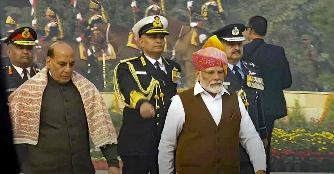 rime Minister Narendra Modi with Defence Minister Rajnath Singh arrives to pay homage at the National War Memorial on the 75th Republic Day, in New Delhi, Friday, Jan. 26, 2024. Photo: PTI