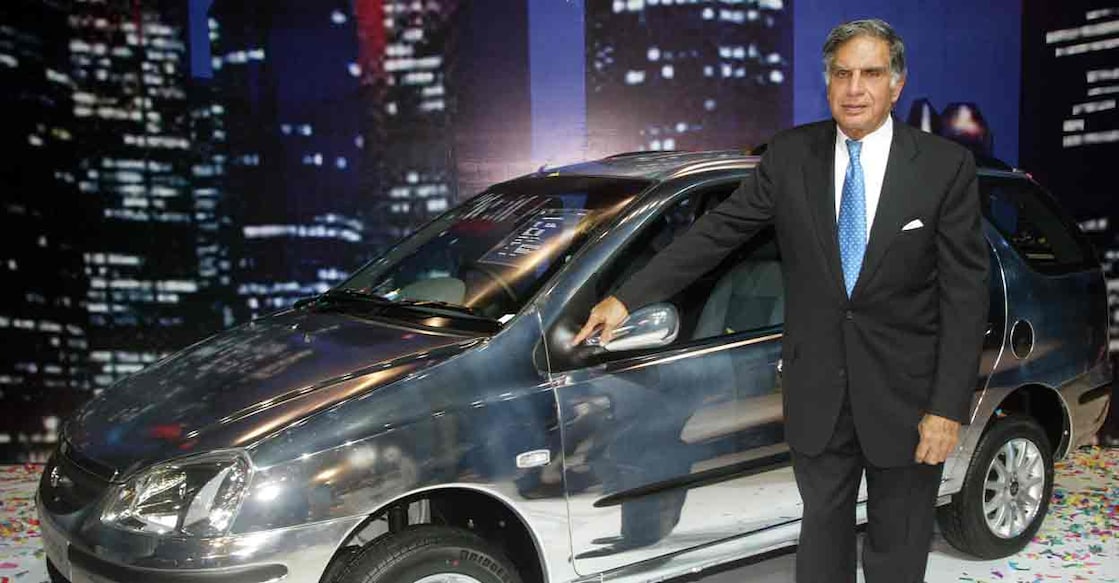 Ratan Tata, chairman of Tata Motors Ltd, poses with company's new estate version Indigo 'Marina' car, during its launch in Bombay September 15, 2004. File photo: REUTERS/Punit Paranjpe