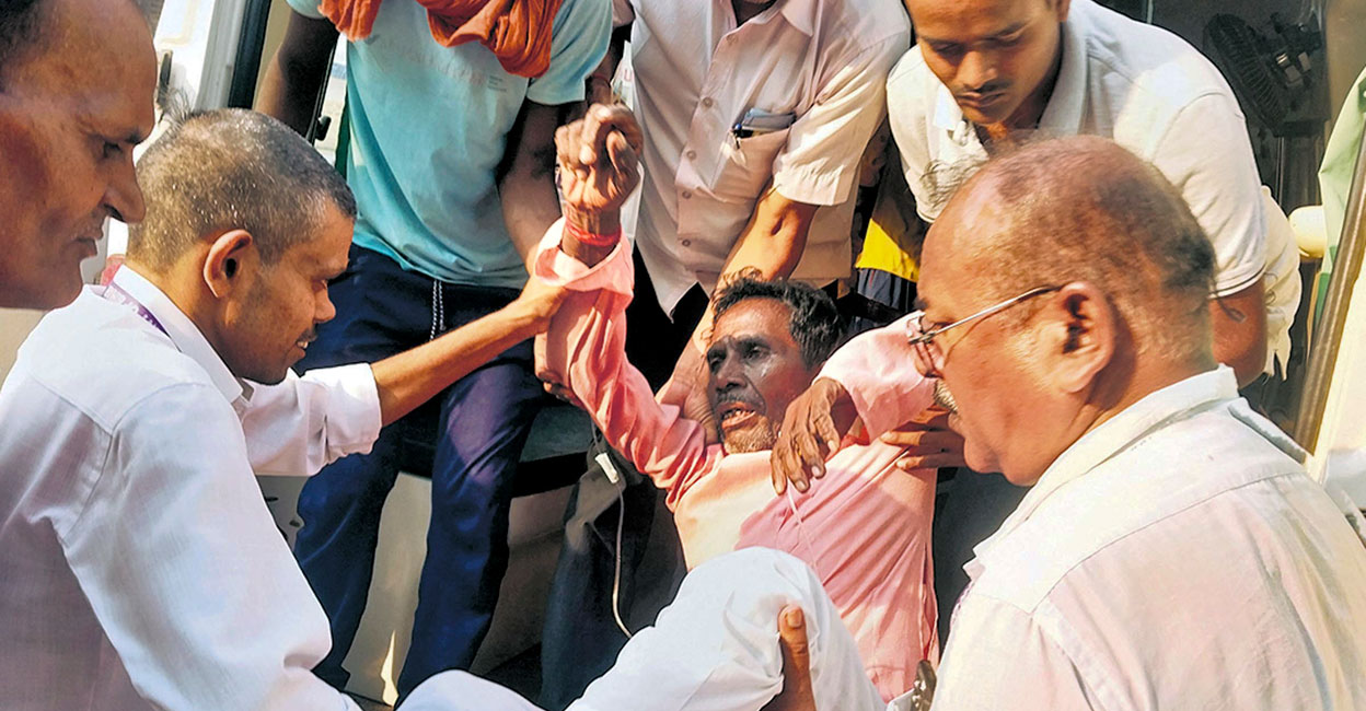 PTI10_17_2024_000170B A man being taken to the hospital after he consumed suspected spurious liquor, in Siwan district, Thursday, Oct. 17, 2024. Photo: PTI