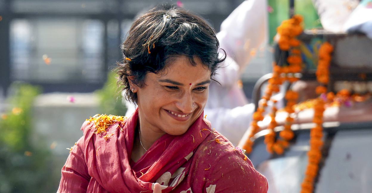 Congress candidate from Julana seat Vinesh Phogat celebrates her win in the Haryana Assembly elections, in Jind district, Tuesday, Oct. 8, 2024. Photo: PTI.