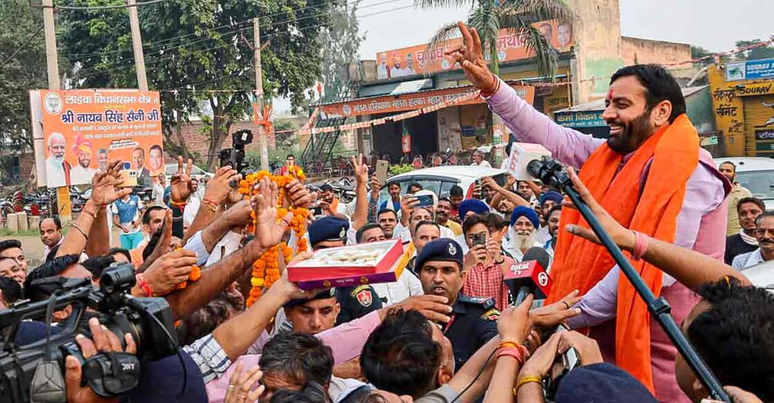 Haryana Chief Minister Nayab Saini greets supporters after winning the Assembly elections from Ladwa constituency, at Ladwa, in Kurukshetra district, Tuesday, Oct. 8, 2024. Photo: PTI