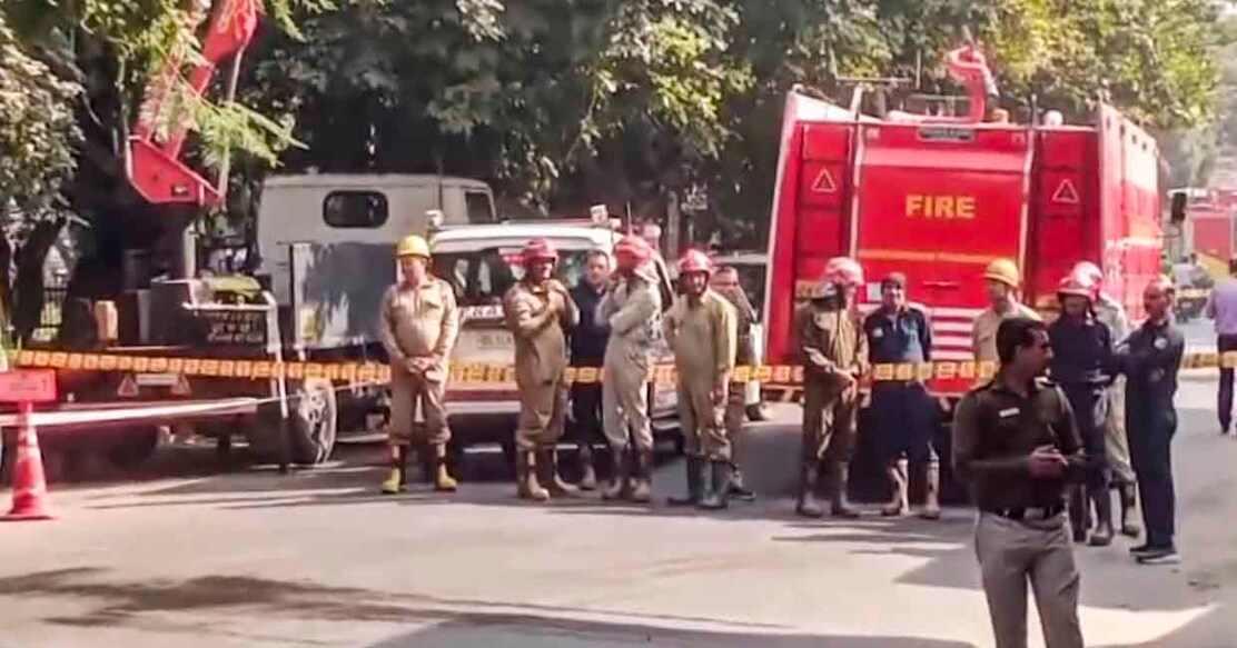 **EDS: SCREENSHOT VIA PTI VIDEOS** New Delhi: Police personnel and firefighters reach the site after a blast was reported near a PVR at Prashant Vihar area, in New Delhi, Thursday, Nov. 28, 2024. (PTI Photo)(PTI11_28_2024_000091B)