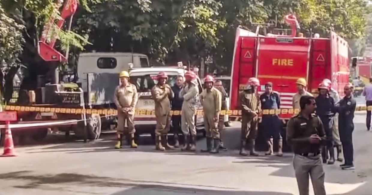 **EDS: SCREENSHOT VIA PTI VIDEOS** New Delhi: Police personnel and firefighters reach the site after a blast was reported near a PVR at Prashant Vihar area, in New Delhi, Thursday, Nov. 28, 2024. (PTI Photo)(PTI11_28_2024_000091B)